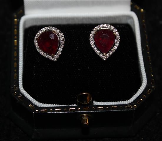 Pair white gold ruby and diamond earrings